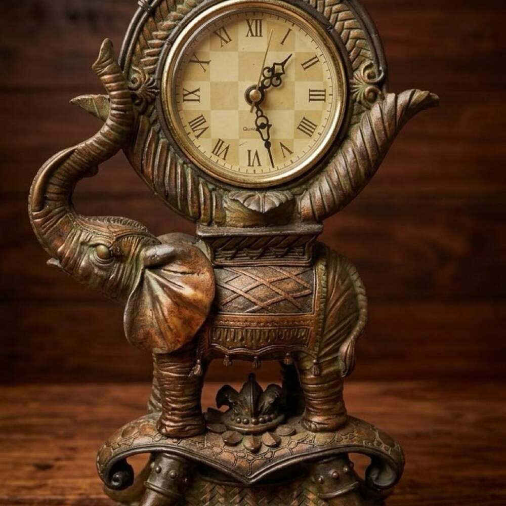 Vintage brass elephant clock